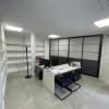 Fabricación y instalación de estanterías  con frente 4 puertas correderas para notaría 